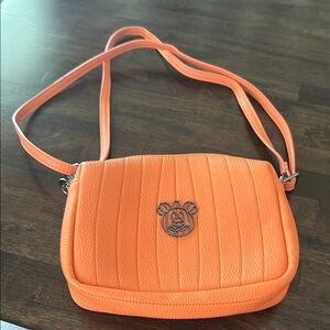 Disney Orange Crossbody Bag with Metallic Emblem